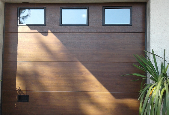 Portão secionado laminado